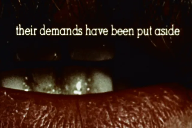 An unclose mouth with text above it reading "their demands have been put aside" 