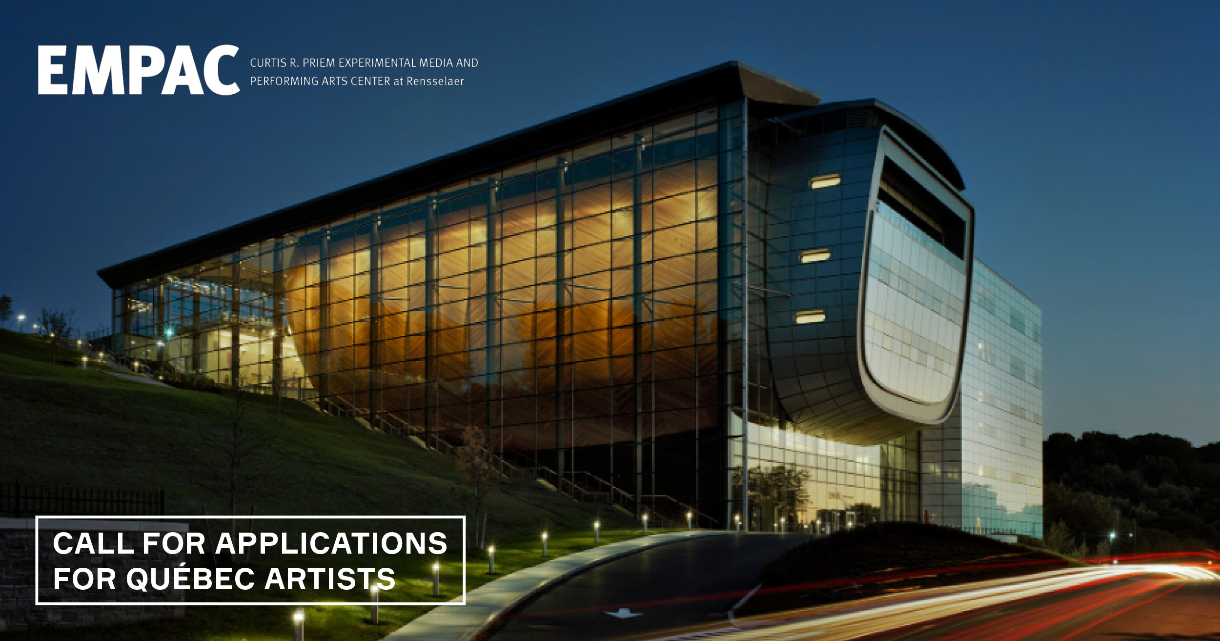 The exterior of EMPAC as cars blurred in motion pass not he street below, call for applications for Quebec artists, EMPAC 