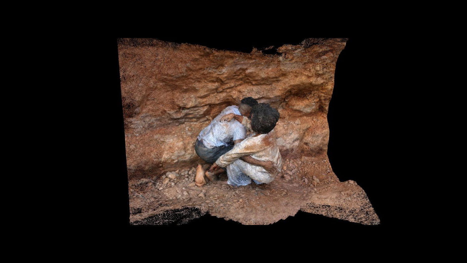 two black persons huddled together against a muddy cliff