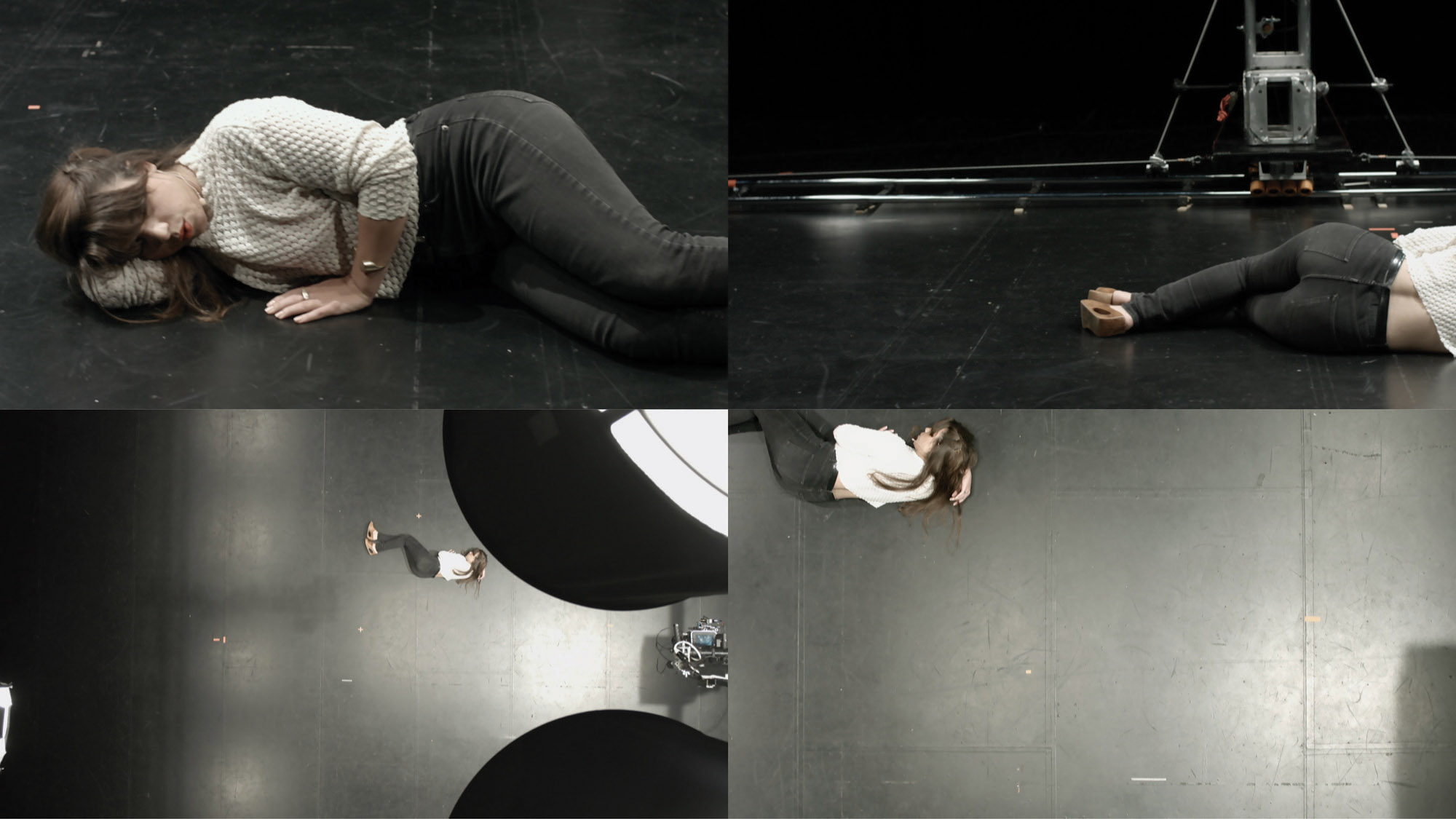 Four frames capturing Patricia Boyd laying down on a black floor from the front, back, and aerial views 