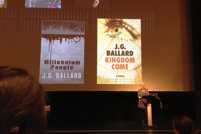 Ursula Heise on stage in lecture.