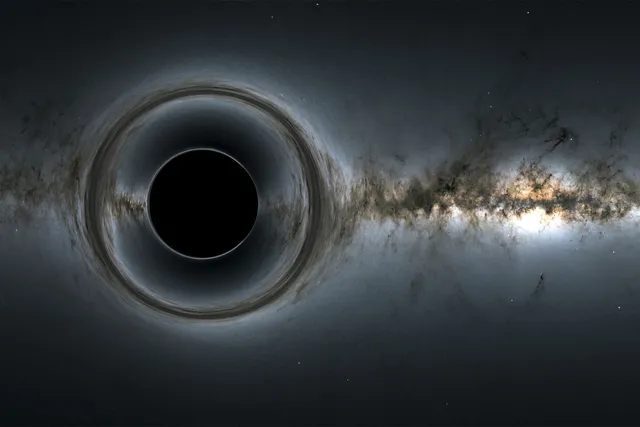 A simulation of a supermassive black hole distorting the milky way like background.