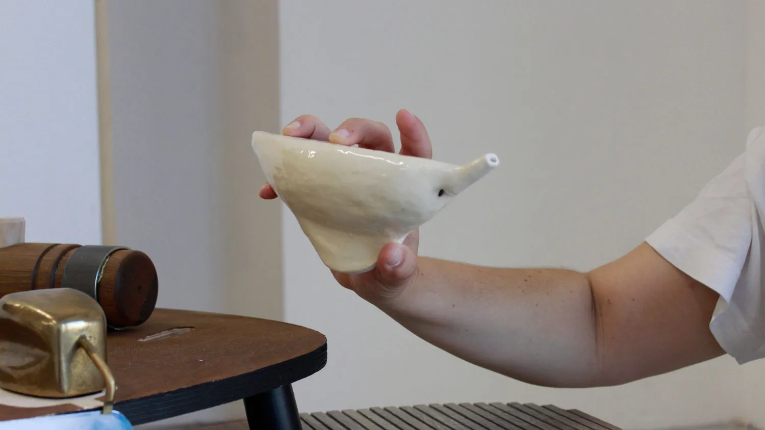 a hand holds a mold